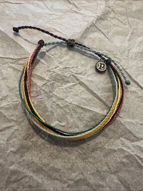 NWOT Pura Vida Pastel Rainbow Braided String Bracelet with Logo Charm